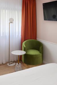 TV a/nebo společenská místnost v ubytování De Cardo Boutique