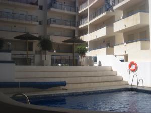 Bazén v ubytování Vivienda en residencial con piscina nebo v jeho okolí