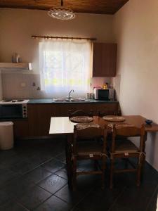 Kuchyňa alebo kuchynka v ubytovaní Aggeliki House 4