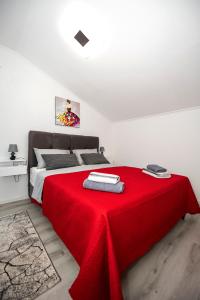 Postel nebo postele na pokoji v ubytování Apartman Marta