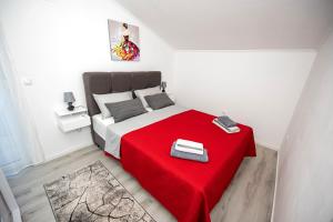 Postel nebo postele na pokoji v ubytování Apartman Marta