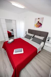 Postel nebo postele na pokoji v ubytování Apartman Marta