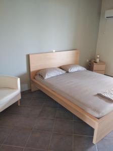 Postel nebo postele na pokoji v ubytování Aggeliki House 4
