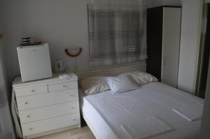 Postel nebo postele na pokoji v ubytování Soba Mira