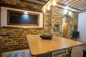 A television and/or entertainment centre at The Backyard Fisherman's House