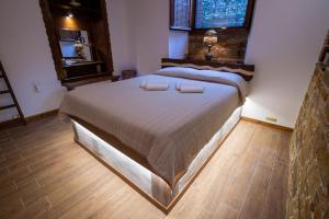 A bed or beds in a room at The Backyard Fisherman's House