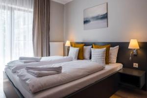 Postel nebo postele na pokoji v ubytování Apartament z widokiem na góry