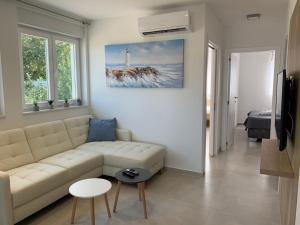 Khu vực ghế ngồi tại APARTMANI SUNSIDE NIN