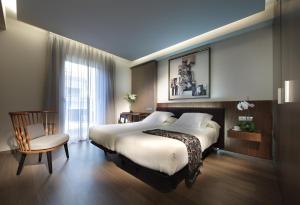 
Cama o camas de una habitación en Hotel Abades Recogidas
