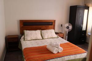 Voodi või voodid majutusasutuse Vicuña Lodge toas