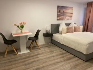Tempat tidur dalam kamar di Prime Host Sophie Apartments