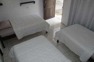 Voodi või voodid majutusasutuse Hotel Cañas toas