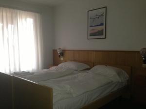 Voodi või voodid majutusasutuse Hotel Olisamir toas