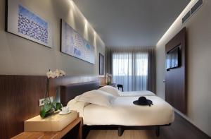 Postel nebo postele na pokoji v ubytování Hotel Abades Recogidas