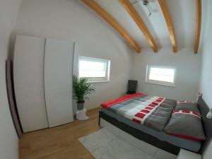 Postel nebo postele na pokoji v ubytování Arlerhof