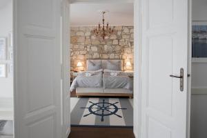 Voodi või voodid majutusasutuse Captain's Suite toas