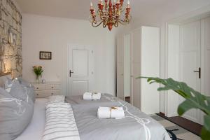 Voodi või voodid majutusasutuse Captain's Suite toas