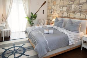 Voodi või voodid majutusasutuse Captain's Suite toas