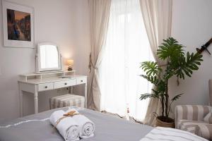 Voodi või voodid majutusasutuse Captain's Suite toas