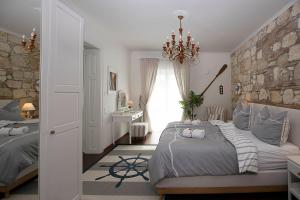 Voodi või voodid majutusasutuse Captain's Suite toas