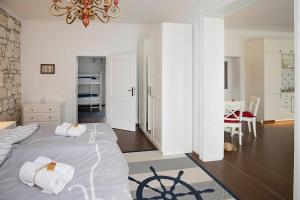 Voodi või voodid majutusasutuse Captain's Suite toas