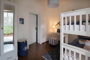 Voodi või voodid majutusasutuse Captain's Suite toas