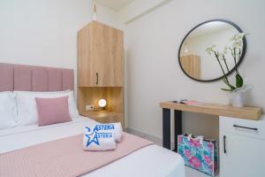 Posteľ alebo postele v izbe v ubytovaní Hotel ASTERA
