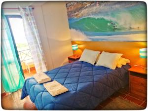 Postel nebo postele na pokoji v ubytování Supertubos Beach Hostel