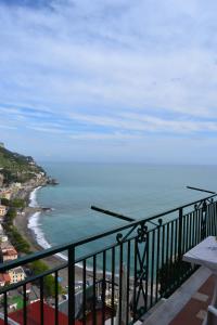a view of the ocean from a balcony at Casa Vacanze Nonno Aldo in Minori