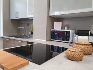 Kuchyň nebo kuchyňský kout v ubytování @home Napoli