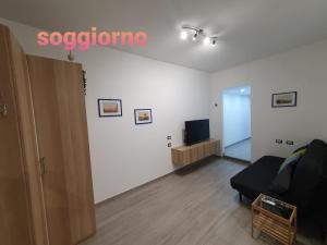 TV a/nebo společenská místnost v ubytování @home Napoli