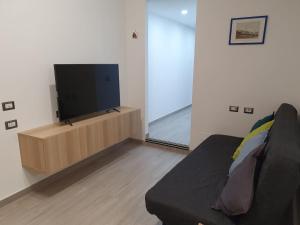 TV a/nebo společenská místnost v ubytování @home Napoli