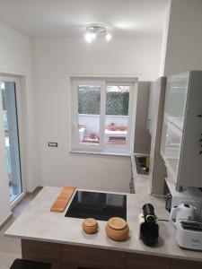 Kuchyň nebo kuchyňský kout v ubytování @home Napoli