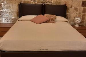 Postel nebo postele na pokoji v ubytování La Dimora del porto + 39 fotografií