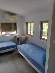 Katil atau katil-katil dalam bilik di Chalet Var Canebières