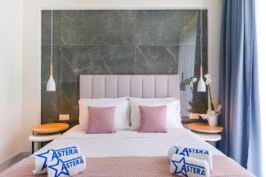 Posteľ alebo postele v izbe v ubytovaní Hotel ASTERA