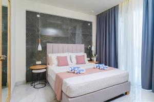 Posteľ alebo postele v izbe v ubytovaní Hotel ASTERA