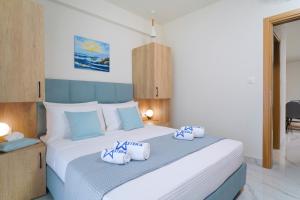 Posteľ alebo postele v izbe v ubytovaní Hotel ASTERA