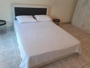 Posteľ alebo postele v izbe v ubytovaní Asteris appartment