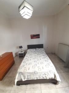 Posteľ alebo postele v izbe v ubytovaní Asteris appartment