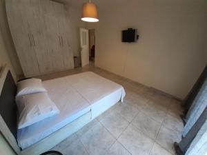 Posteľ alebo postele v izbe v ubytovaní Asteris appartment