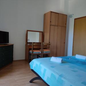 Posteľ alebo postele v izbe v ubytovaní Apartment Yadi