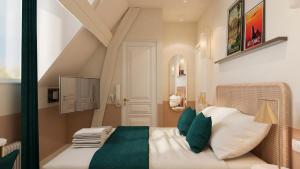 מיטה או מיטות בחדר ב-Grand Hôtel Saint-Aignan