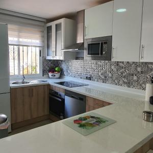 Køkken eller tekøkken på Niza Beach