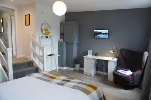 מיטה או מיטות בחדר ב-VIP Church Loft Apartment