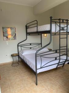 Postel nebo postele na pokoji v ubytování Villa Pyrgos