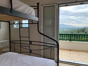 Postel nebo postele na pokoji v ubytování Villa Pyrgos