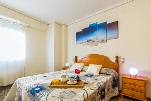 Llit o llits en una habitació de MoYma Playa
