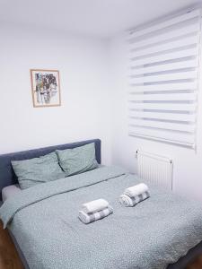 Posteľ alebo postele v izbe v ubytovaní Apartman Istra, Doboj