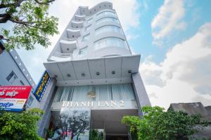 a building with a sign that reads hamlin lan at Thanh Lan Riverside Hotel Da Nang in Danang